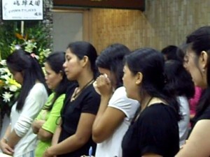 Family and Friends of Vicky Flores During the Service